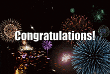 a fireworks display with the words congratulations on it13177480073589019539